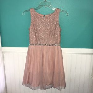 Elegant pink dress with back cut outs